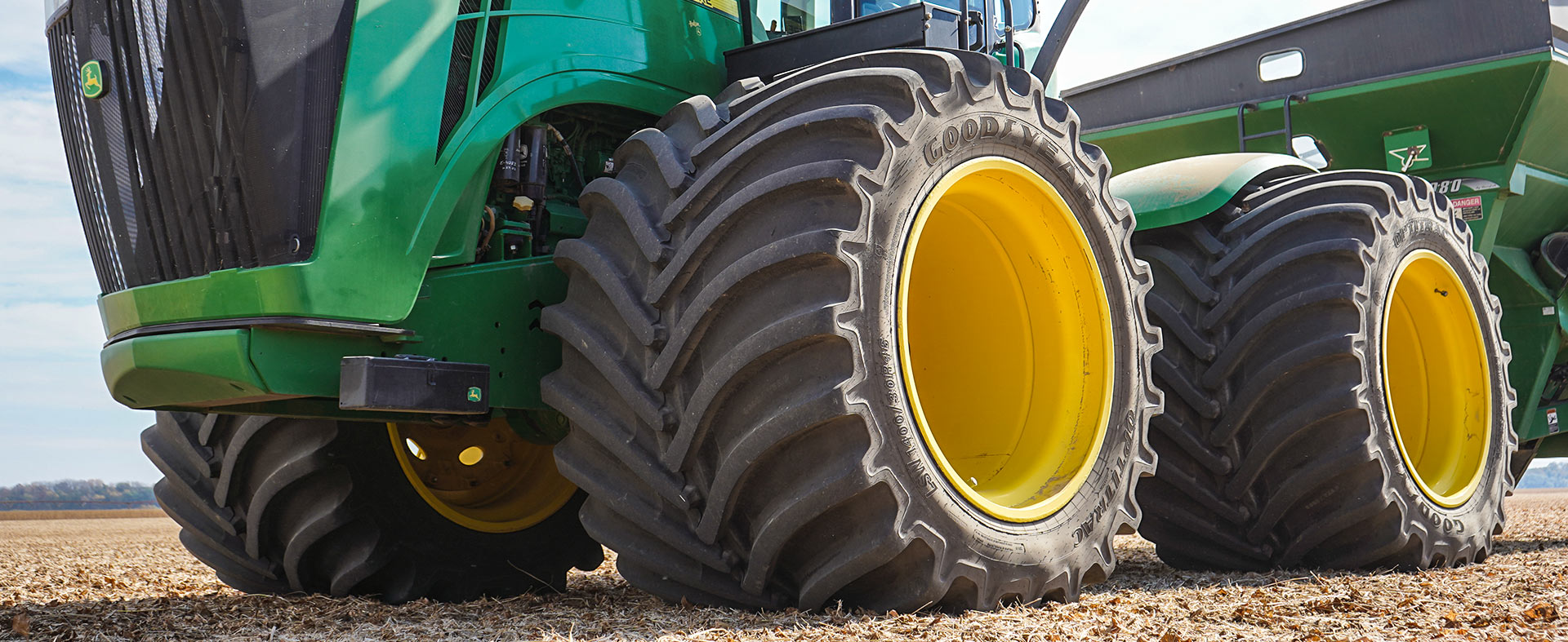 close up of the wheels of a John Deere tractor