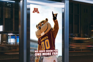 U of M "saturday's coming" bus ad